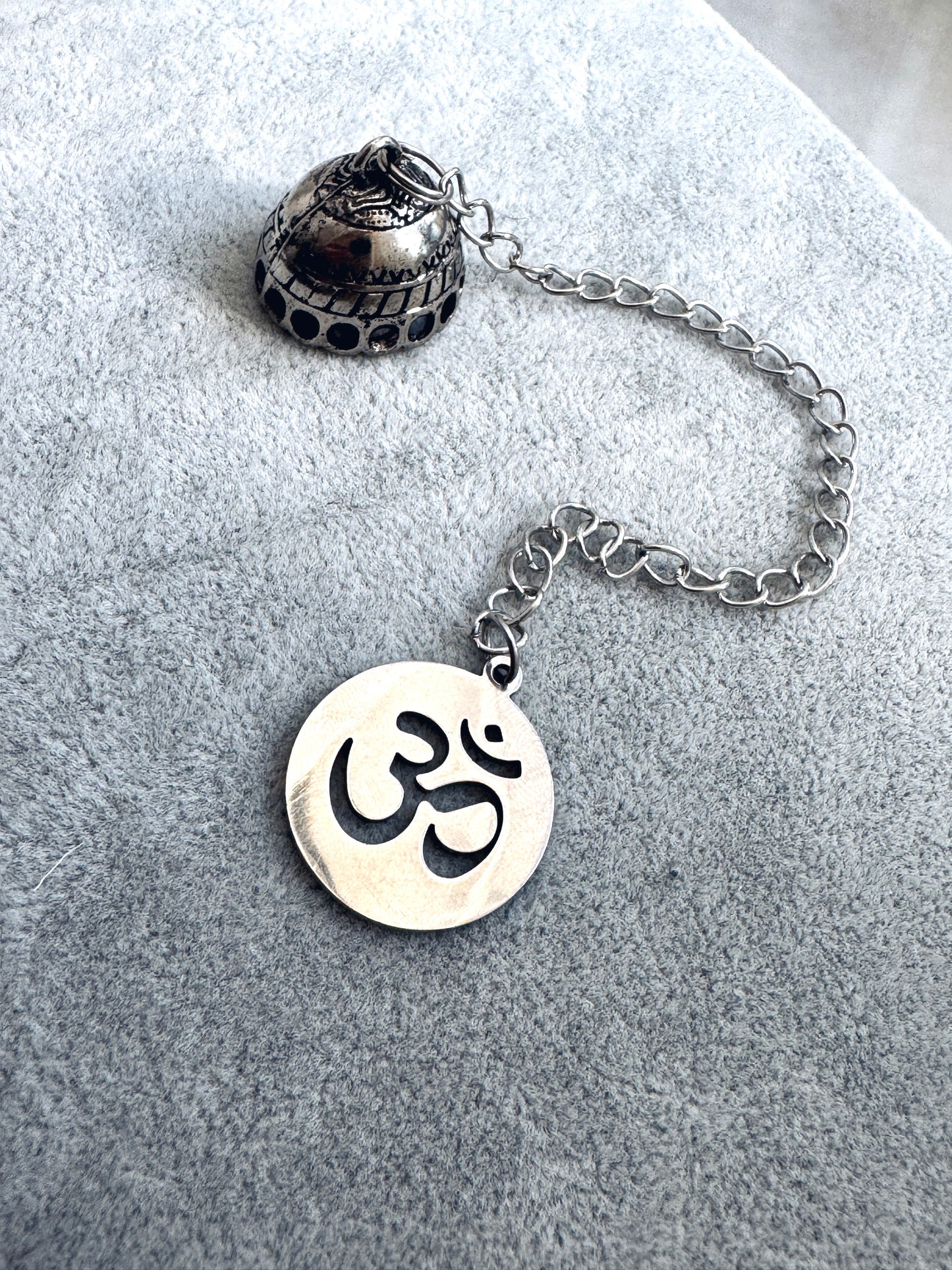 Apagavelas “Om”